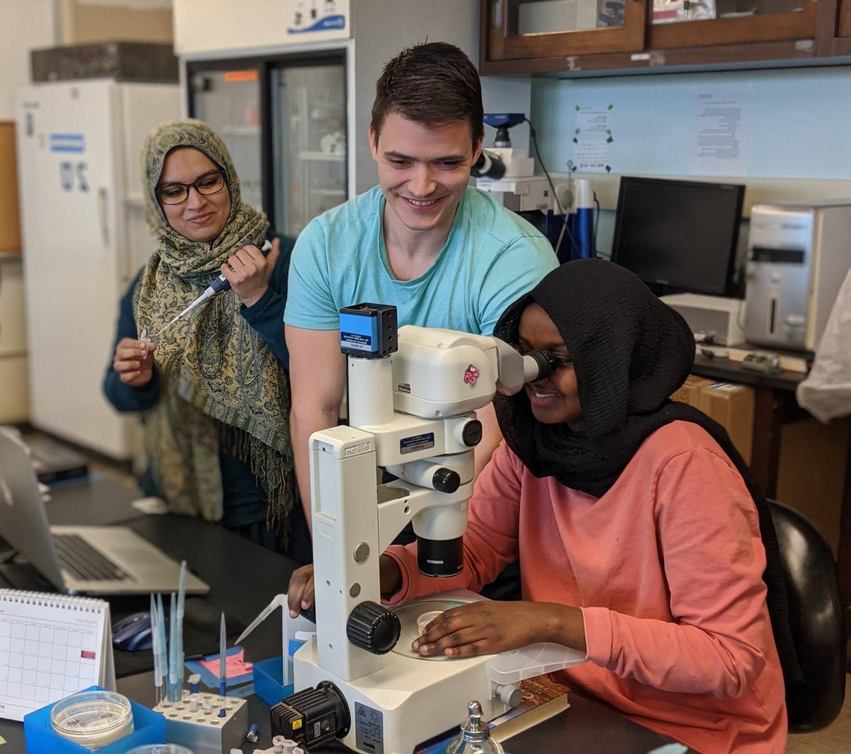 student doing research in biology lab